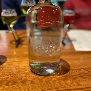 a bottle of alcohol on a table