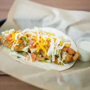 Trailer Park - FRIED CHICKEN, GREEN CHILES, LETTUCE, PICO DE GALLO &amp; CHEDDAR JACK CHEESE WITH POBLANO SAUCE ON A FLOUR TORTILLA.