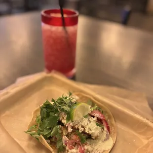 The Baja Salmon Taco with sangria on the rocks made