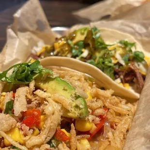 Fo Sho!! Veggie taco!!! And Crossroads taco smoked beef brisket