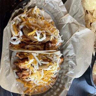 Chicken Fajita w fried avocado and sour cream on flour tortilla