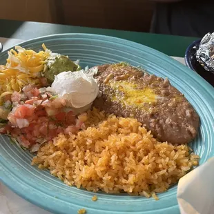 Mexican rice, bean, pico de gallo, cheese, lettuce and sourcream