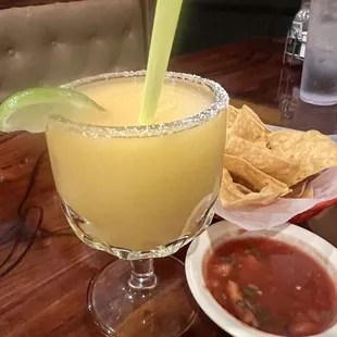 Frozen mango margarita and chips and salsa