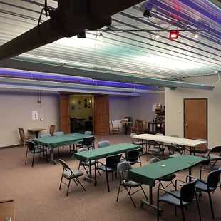 tables and chairs in a large room