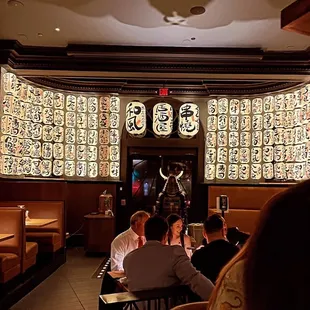 a group of people sitting at tables