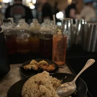 Garlic Crab Fried Rice  and shrimp skewers with Berry punch.