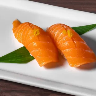 Salmon Sushi with yuzu on the top