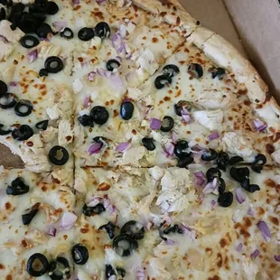 Torino &apos;s White Pizza with chicken, onion, and black olives