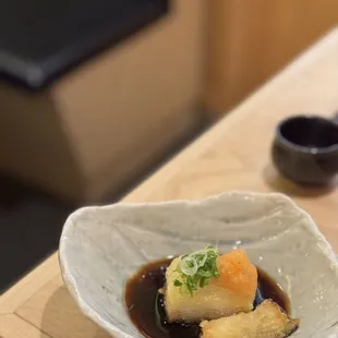 a bowl of food on a table