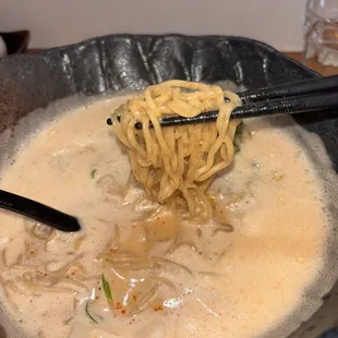 This is the spicy Dan Dan ramen soup 10/10 highly recommend!!! The broth is So rich and creamy and the best honestly