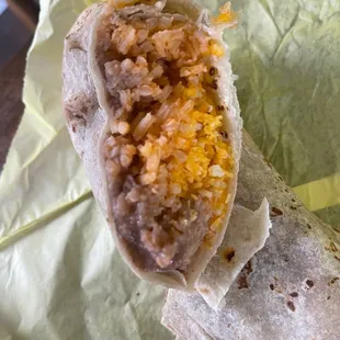 Inside of bean and cheese burrito-rice added