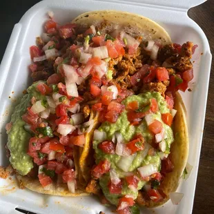 Adobada tacos with guacamole and pico