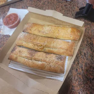 That&apos;s the pizza sticks. They are sub ok... they weren&apos;t even cooked all the way. They suck here. Find a better place to go.