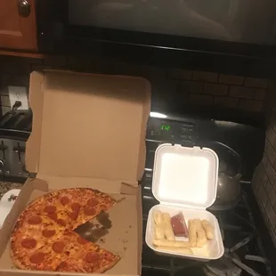 a slice of pizza in a box