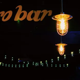 two light bulbs hanging from the ceiling