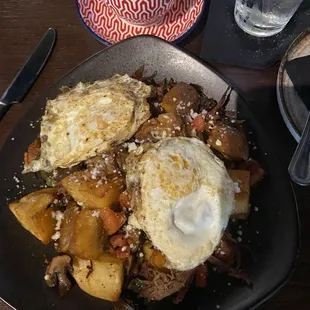 a plate of food and a cup of coffee