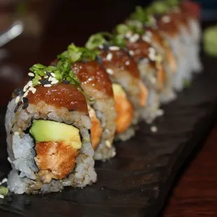 The Angry Scorpion Roll is made with spicy tuna, crab, avocado, cucumber &amp; sesame.