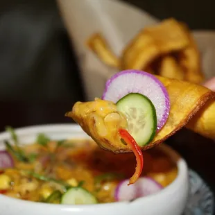 The Ceviche Amarillo is made with ahi tuna, aji amarillo, mango, cucumber &amp; red onion.