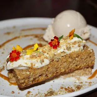 The Pumpkin Bread Cake is made with Caramel &quot;tacha&quot; pumpkin / orange blossom milk / spiced pepitas / cinnamon ice cream.