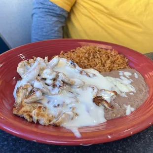a plate of mexican food on a table