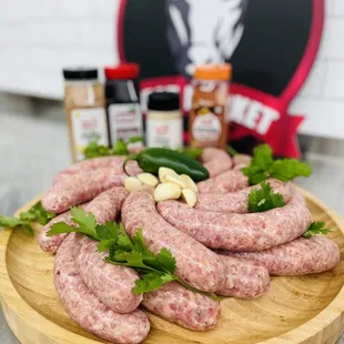 a pile of sausages on a cutting board