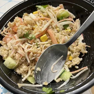 a bowl of rice and vegetables