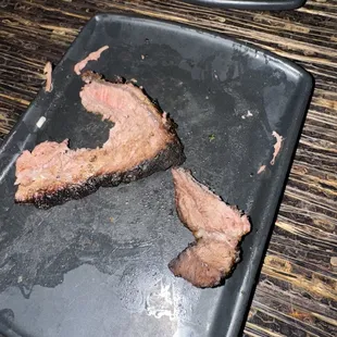 What the end of our steak look like - clearly well done here. This was a slice I tired to eat and realized it's not right.