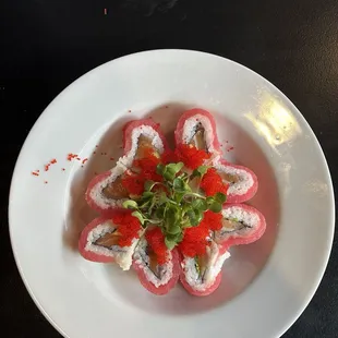 Cherry blossom roll, so cute! Avocado, tuna, salmon and roe.