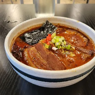 Classic slow cooked broth with pork shoulder and pork belly medium spicy