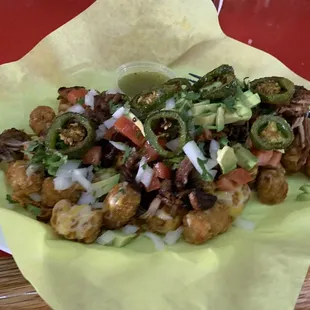 Carnitas on tater tots