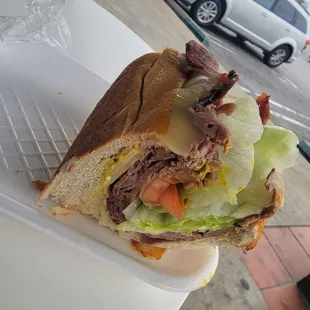 Thick, tasty roast beef sandwich on a soft roll