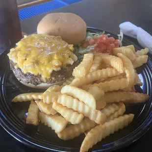 Cheeseburger with grilled onions and French fries! Classic Burger