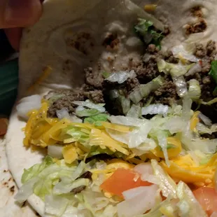 Inside of a soft taco.