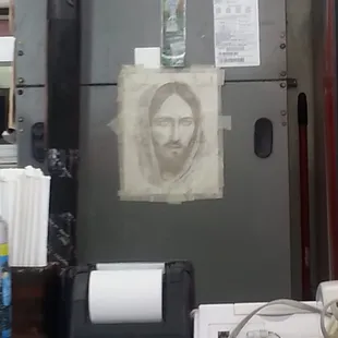 Jesus on the dashboard...ok wall not dashboard.