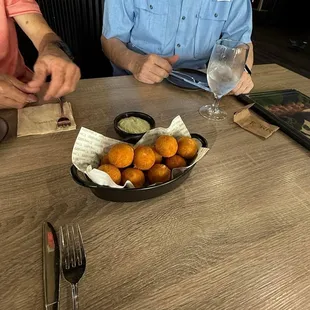 Fried soft dough filled with mozzarella cheese