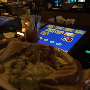 Spinach, bacon and cheese omelet.  With home fries and a bloody...   Happy Valentines