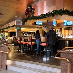 a view of the bar and dining area