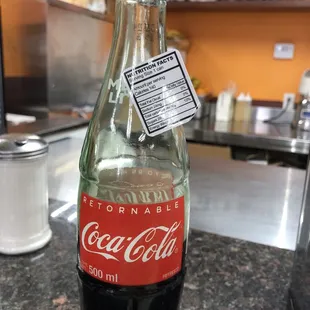Bottled Mexican coke. Fun fact: low calorie and less sugar than plastic bottles and even canned soda which is over 200 calories.
