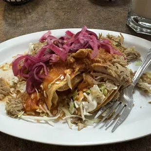 Taco dorado de papa y requeson - topped with carnitas A+++