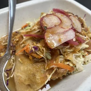 Tacos dorados rellenos de papa con carne .  Hard tacos filled with potatoes and meat