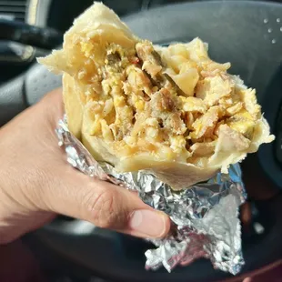 The number 1, filled with eggs sausage cheese bacon ham and potatoes. So good especially with hot sauce. Comes out perfectly warm too.