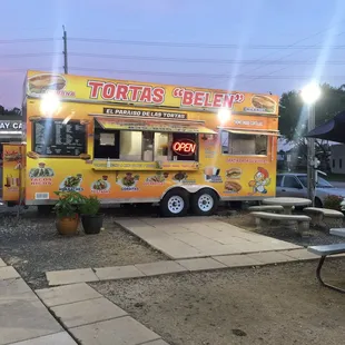 a food truck parked on the side of the road