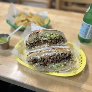 a sandwich on a yellow plate