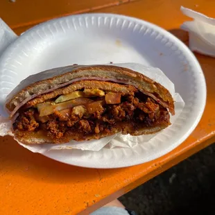 Torta Francesa - has ham, milanesa de asada, avocado, onion, tomato, chorizo