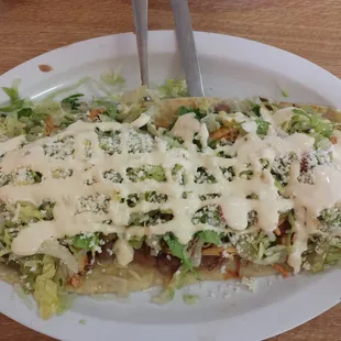 Huarache de pollo.
