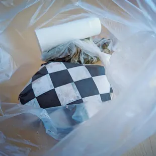 a stuffed animal in a plastic bag
