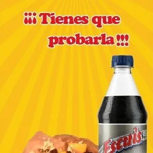 a bottle of soda and a sandwich