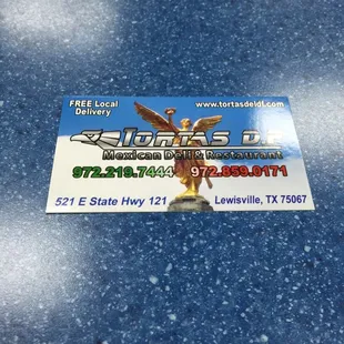 Business card depicting an iconic symbol of Mexico City. The independence angel.