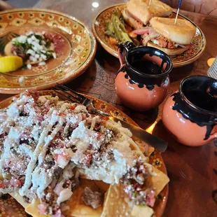 Our favs! Torta cubana, birria taco and charro nachos