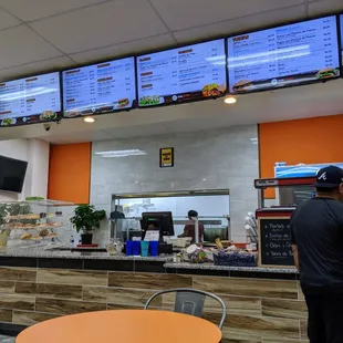 Inside. Ordering counter. Menu overhead. Notice they put their Atlanta Magazine Best Tortas 2018 award above the kitchen window.